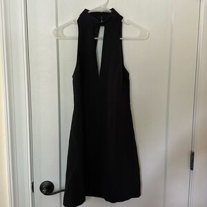 NWOT EXPRESS black cocktail dress with lace detail on the back!